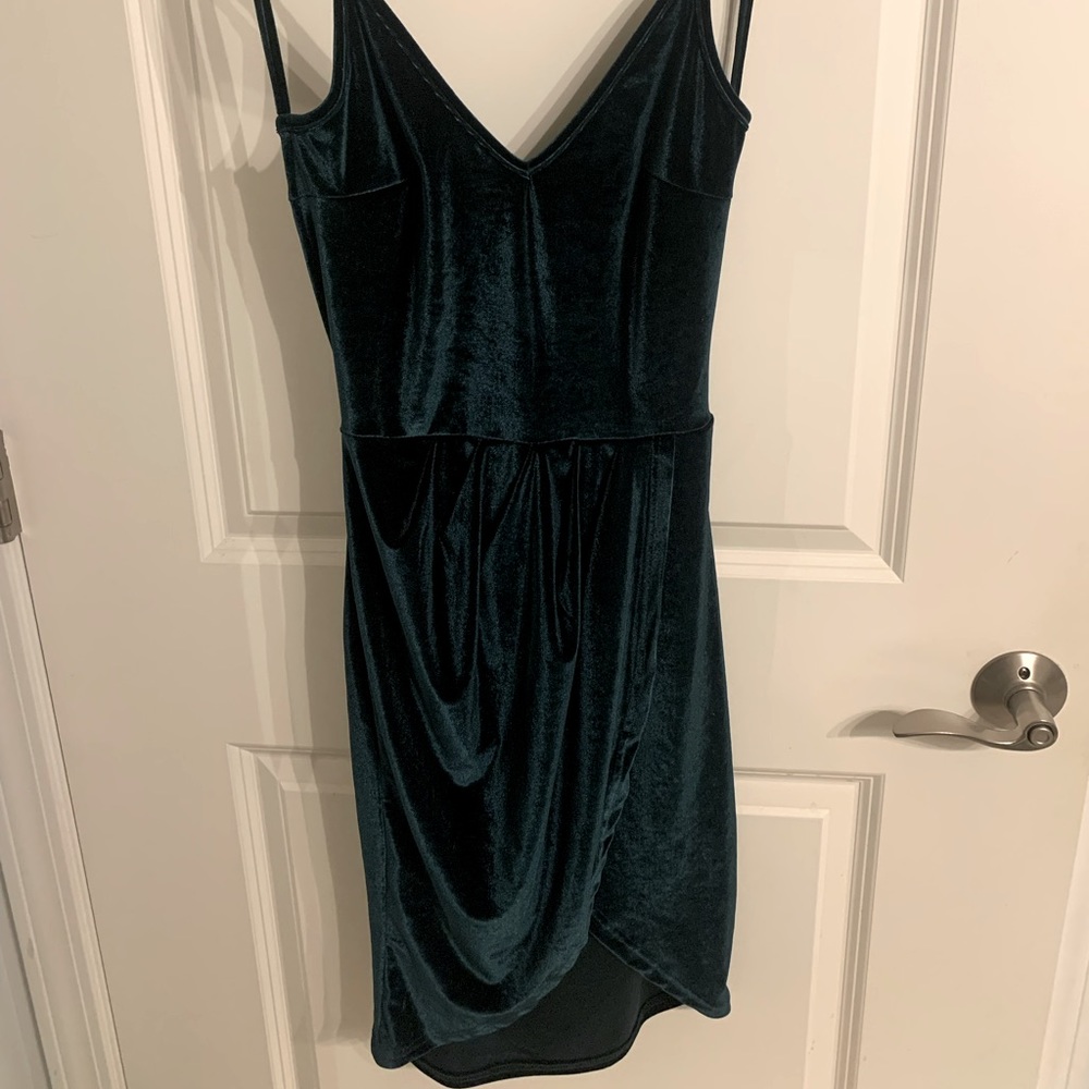 Emerald green velvet dress